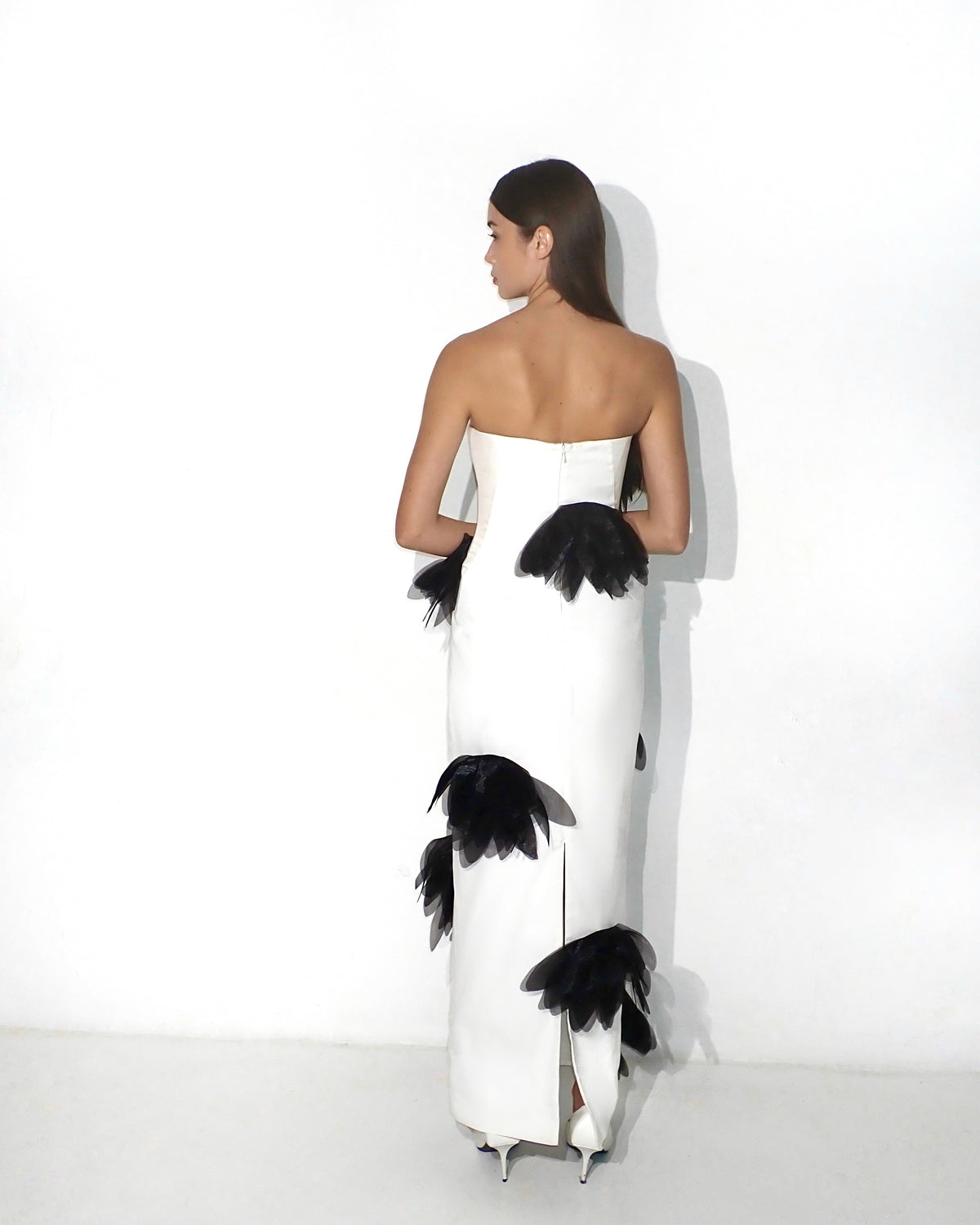 Strapless floral-appliqué column gown in white