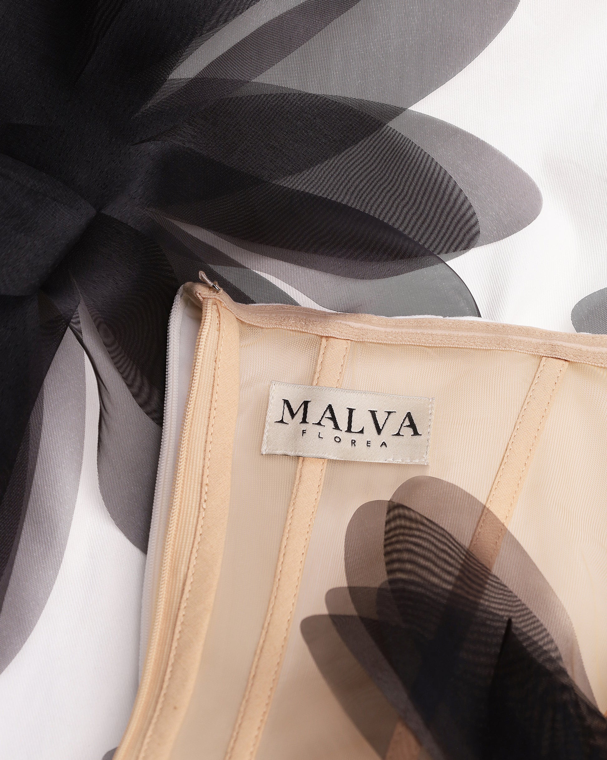 Strapless floral-appliqué column gown in white