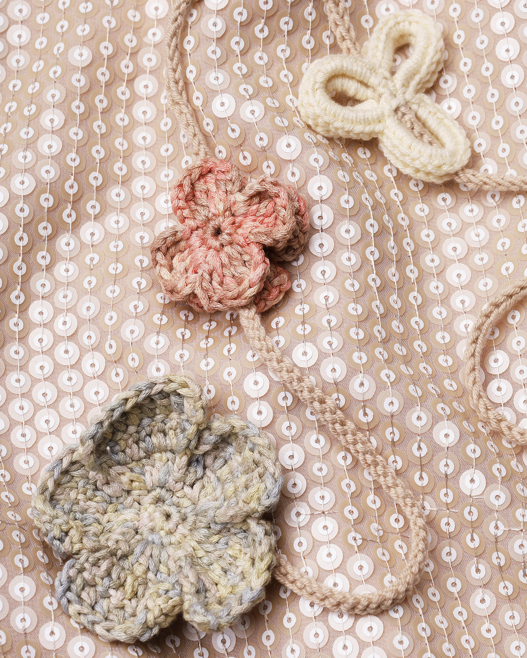 Sleeveless sequin maxi dress with floral tassels in beige