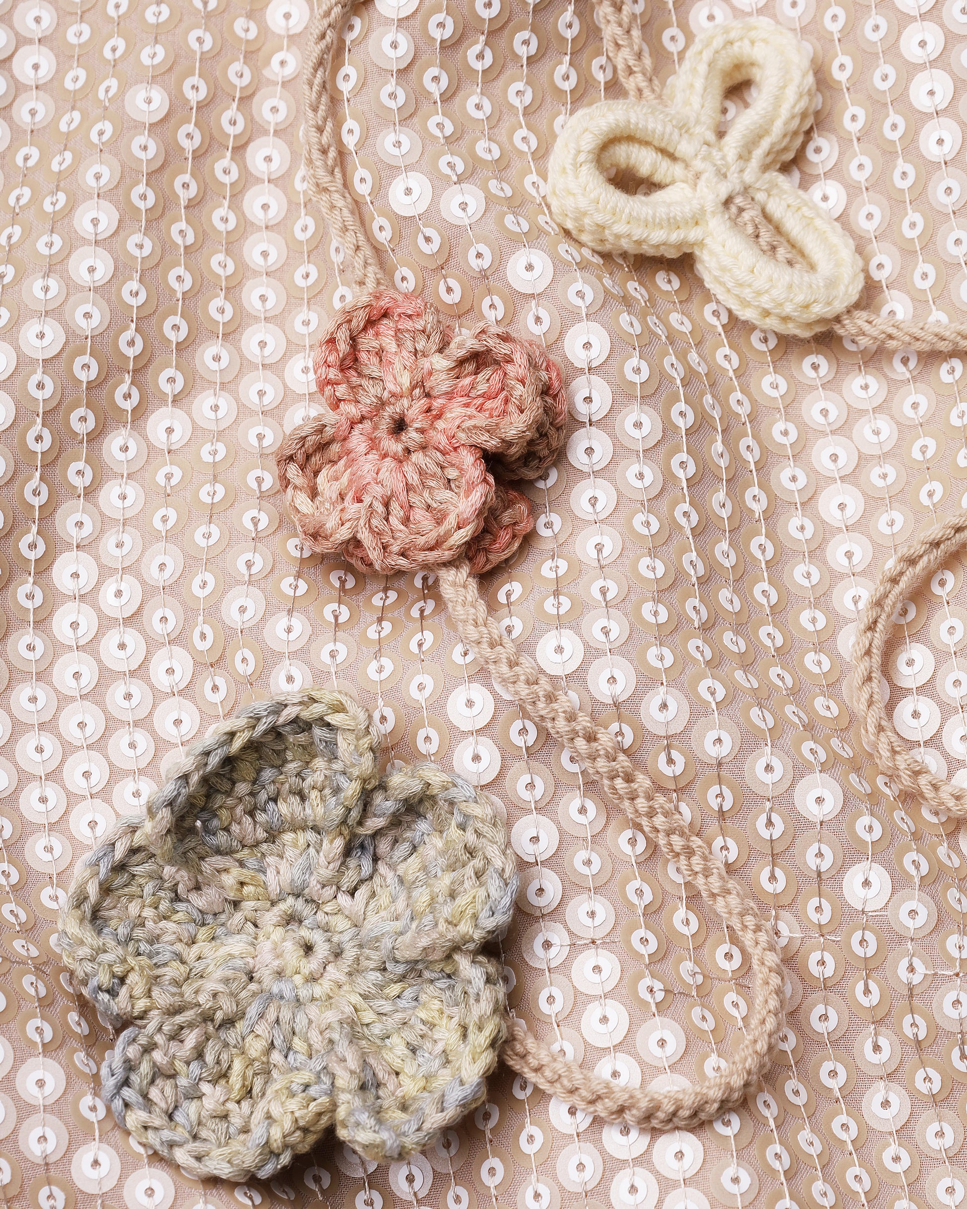 Sleeveless sequin maxi dress with floral tassels in beige