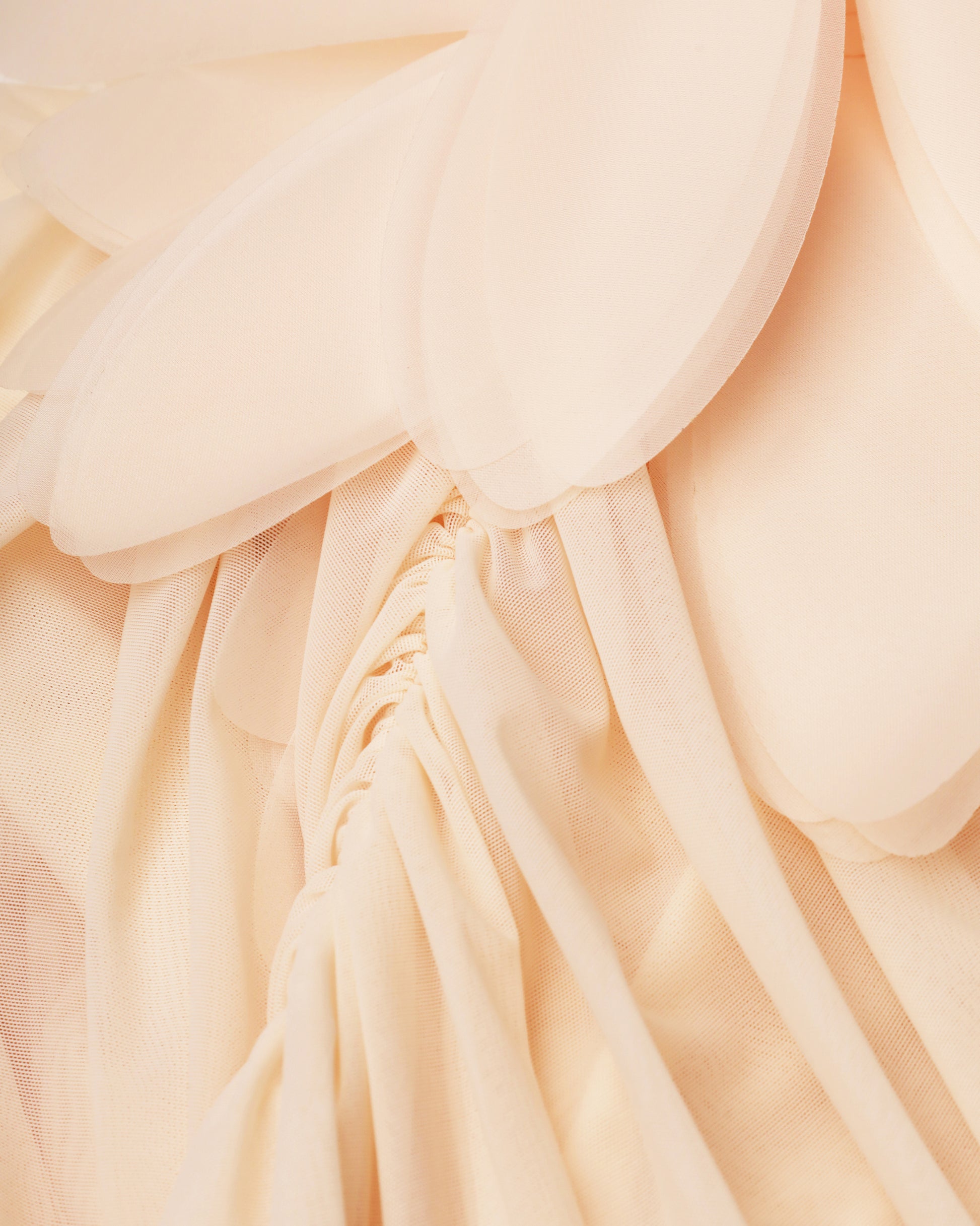 Draped mini dress with oversized florals in light apricot