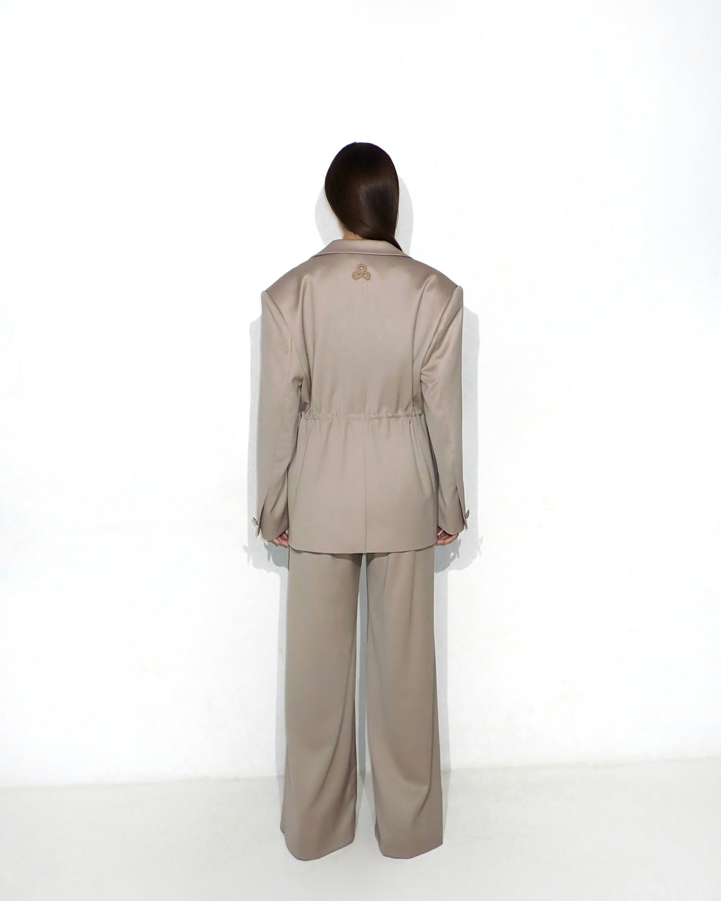 Bias-cut flared pants with slip detail in cappuccino