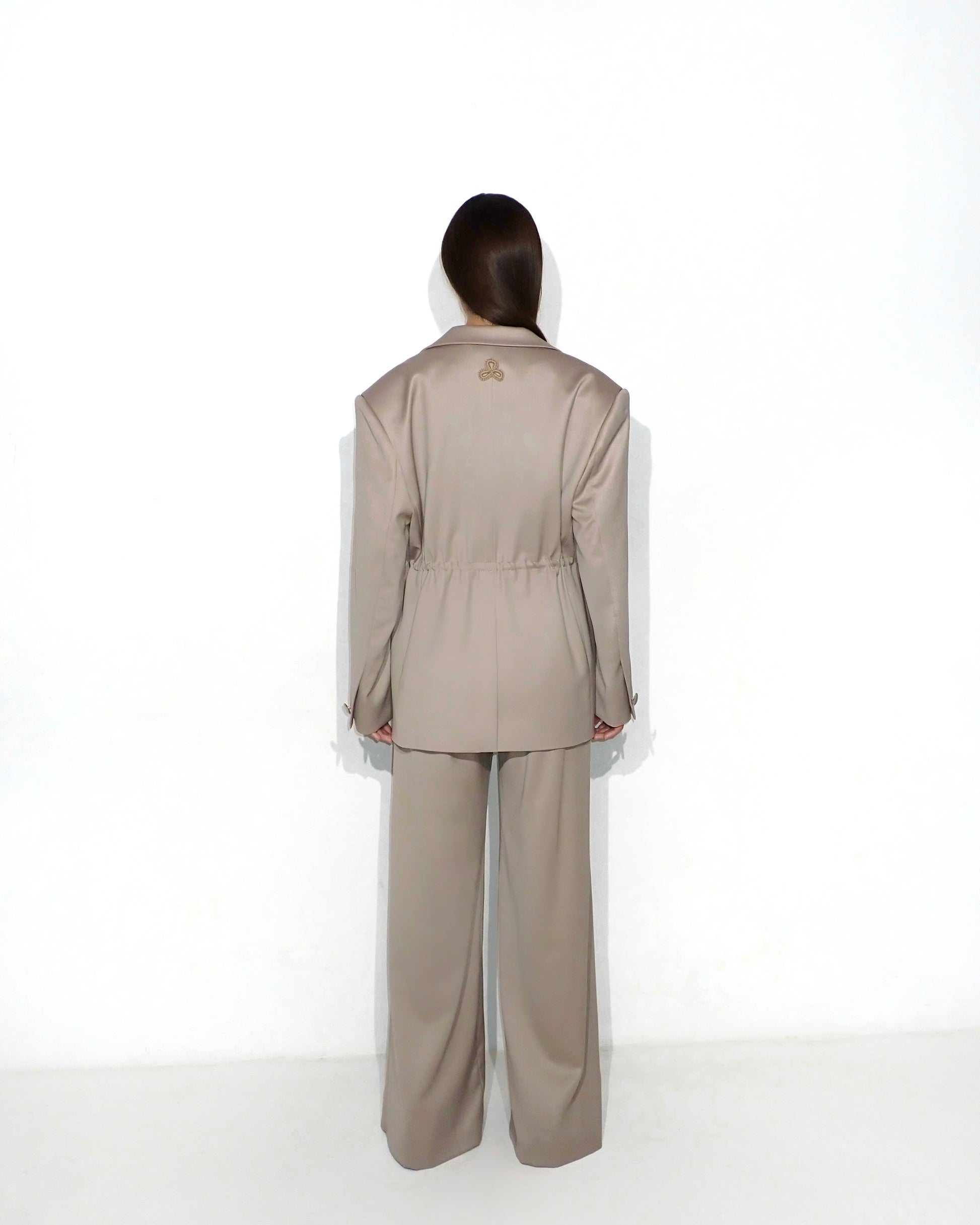 Bias-cut flared pants with slip detail in cappuccino
