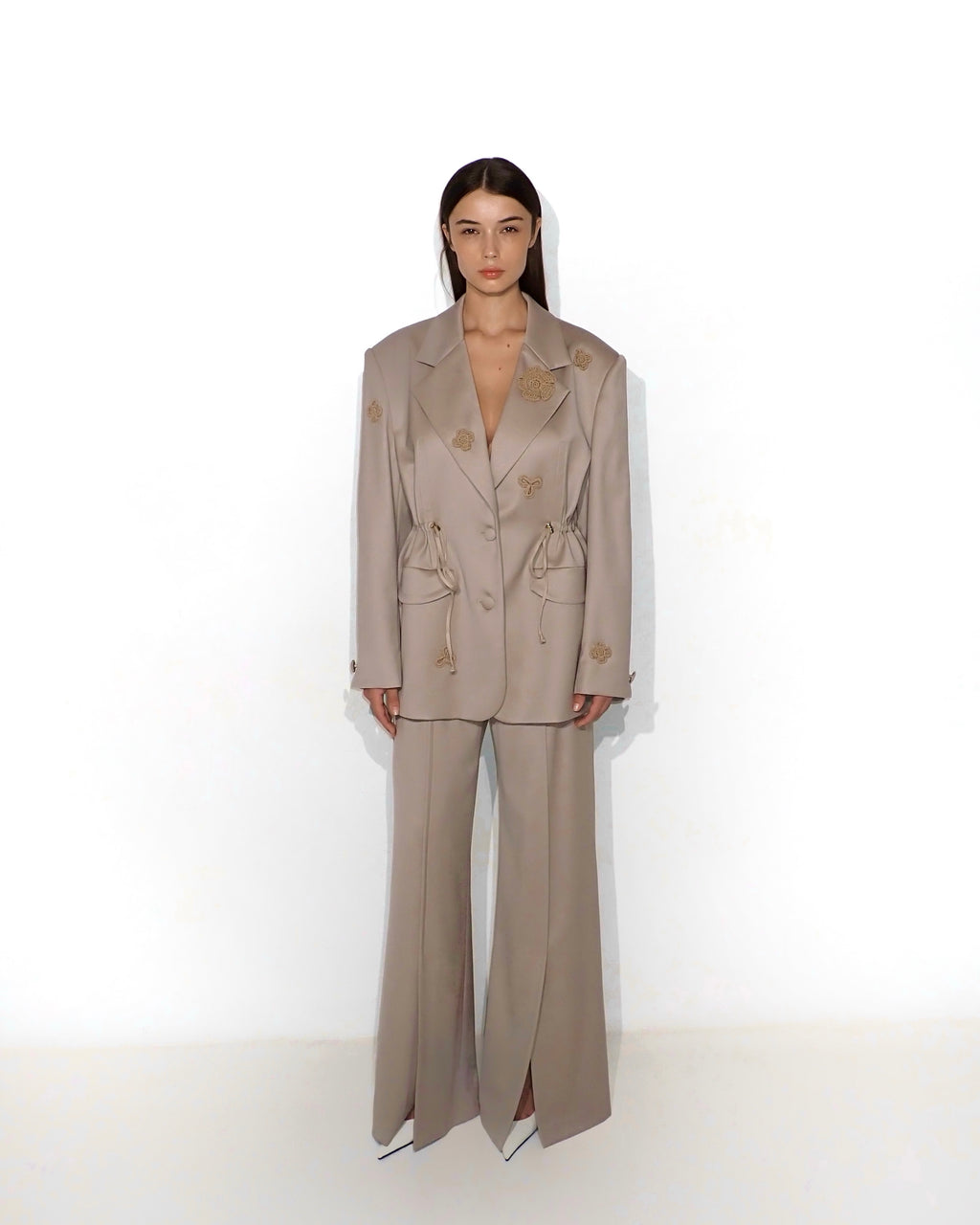 Bias-cut flared pants with slip detail in cappuccino