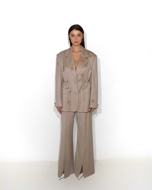 Bias-cut flared pants with slip detail in cappuccino