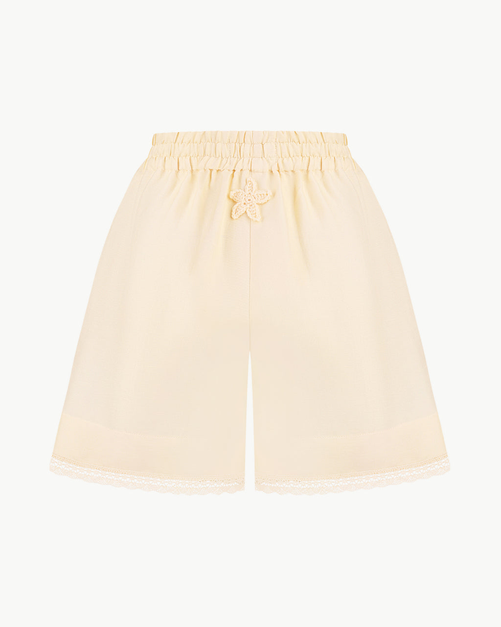Lace-trimmed high-waisted shorts in light apricot