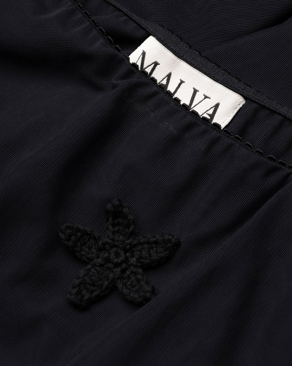 Flowing mesh floral-appliqué maxi skirt in black