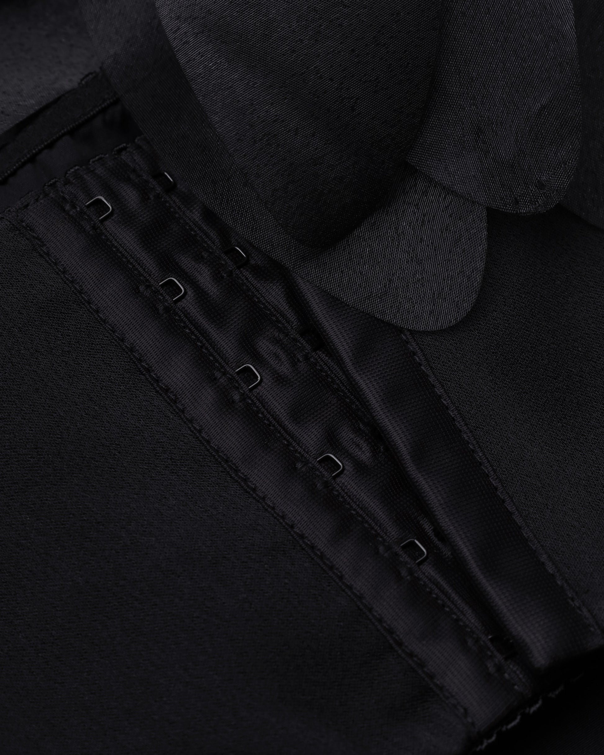 Spaghetti-strap floral-appliqué cropped top in black