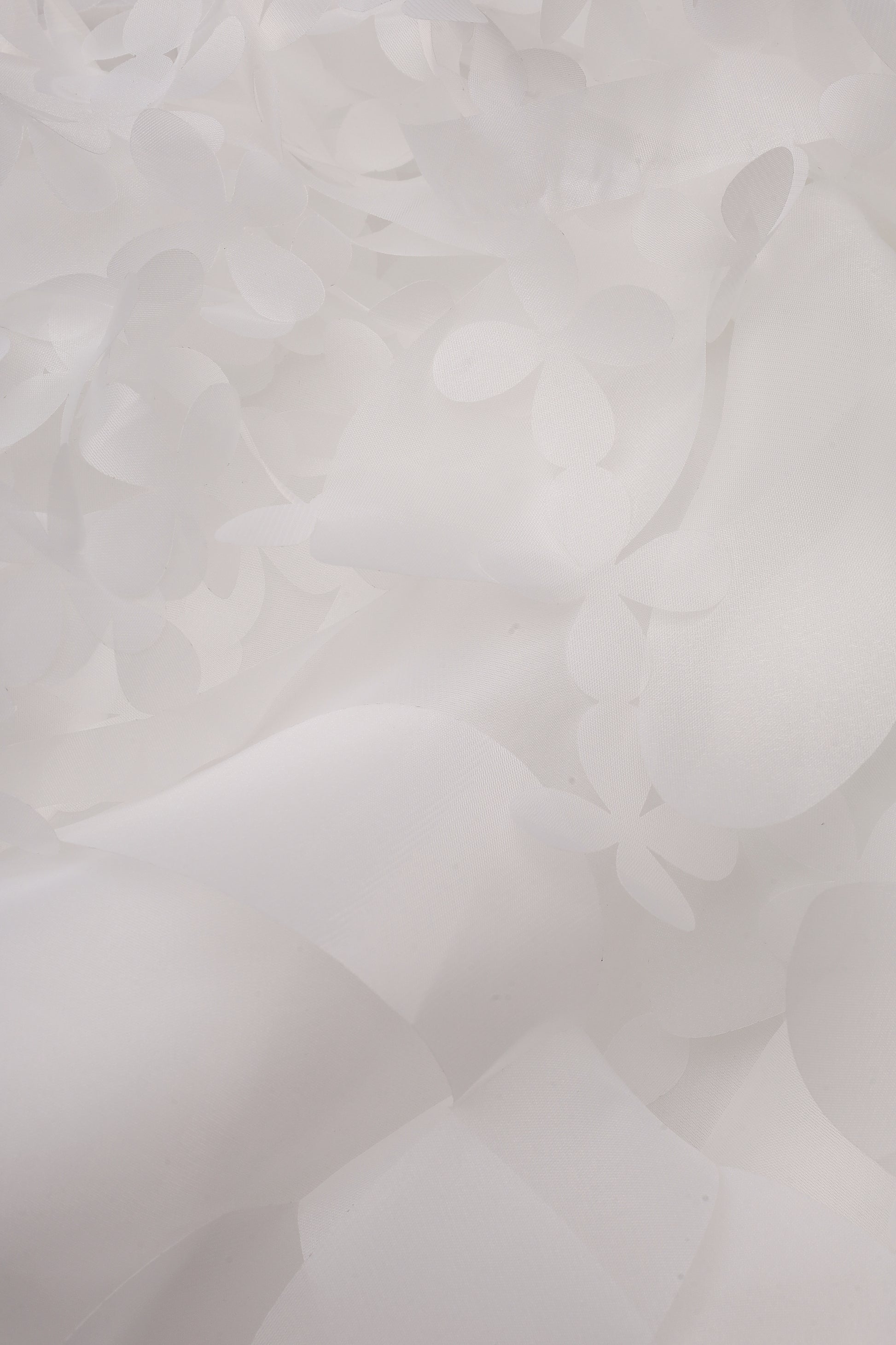 Voluminous sheer floral-appliqué blouse in white