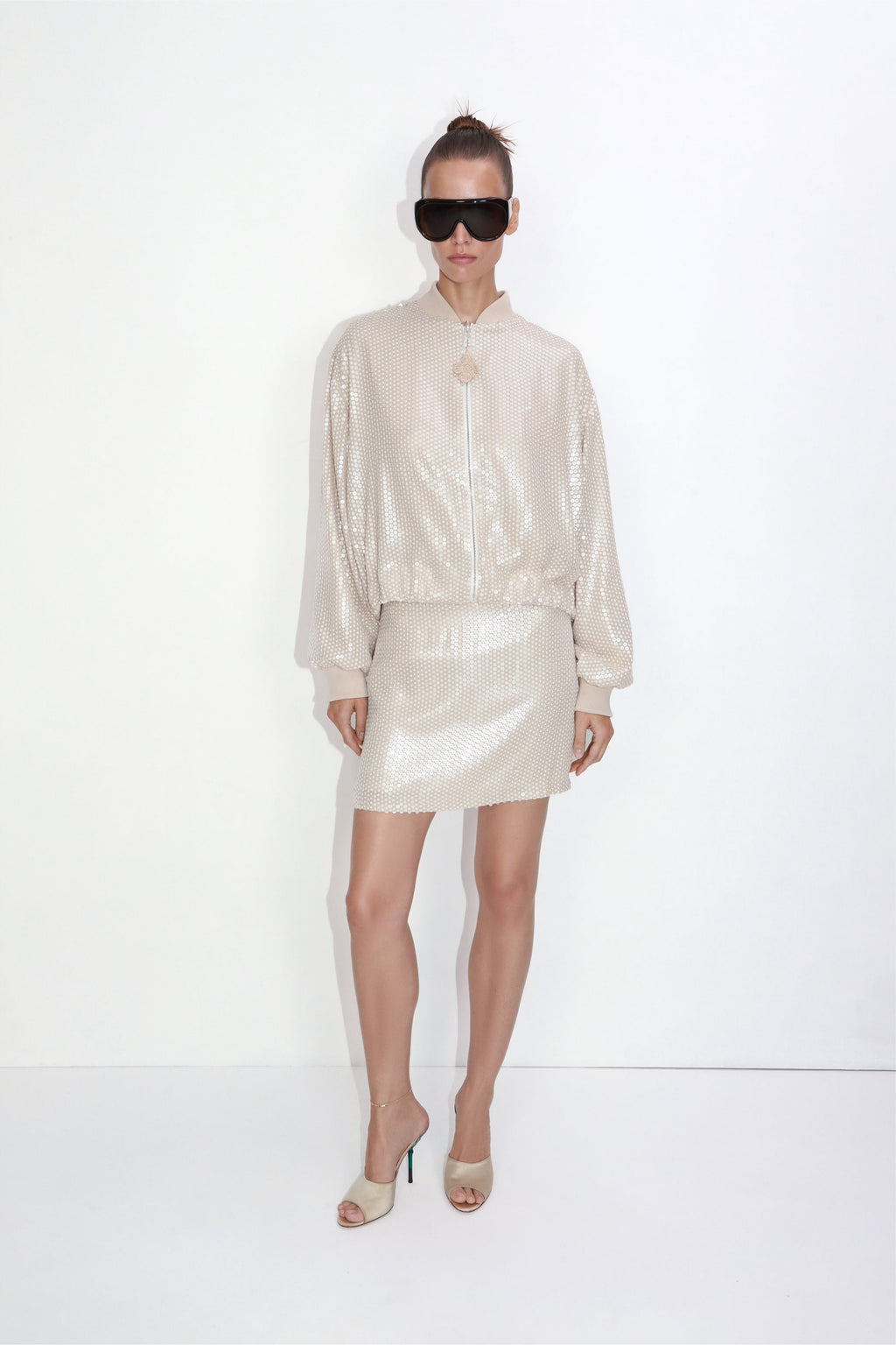 Fitted mini sequin skirt with viscose-acetate lining