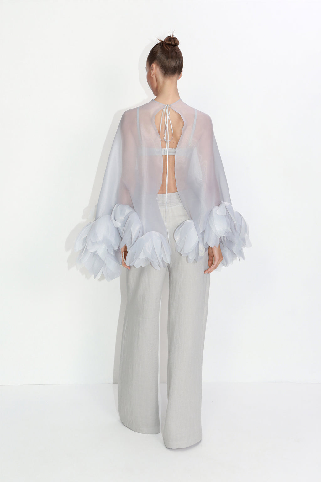 Bustier top with sheer floral cape in gray