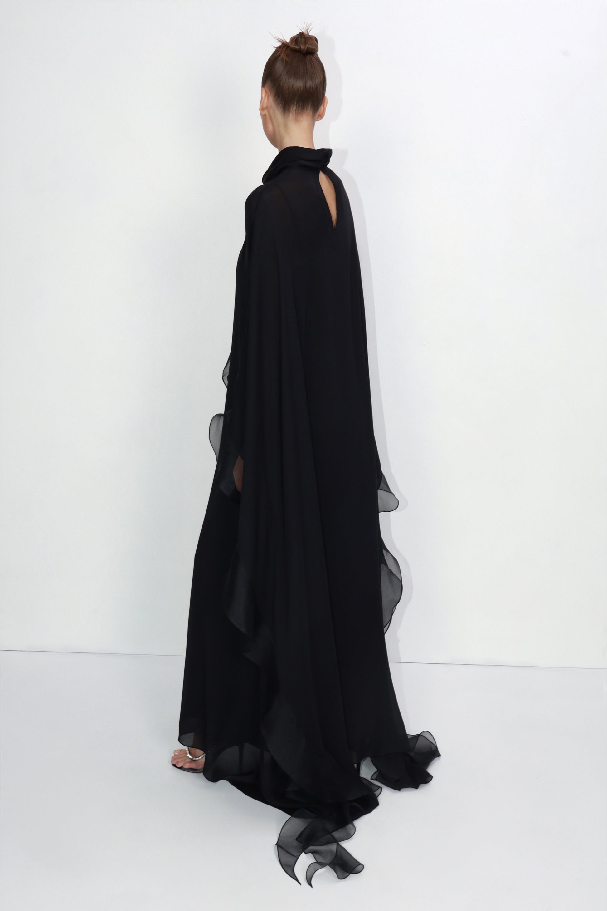Slip dress with floral ruffle cape in black