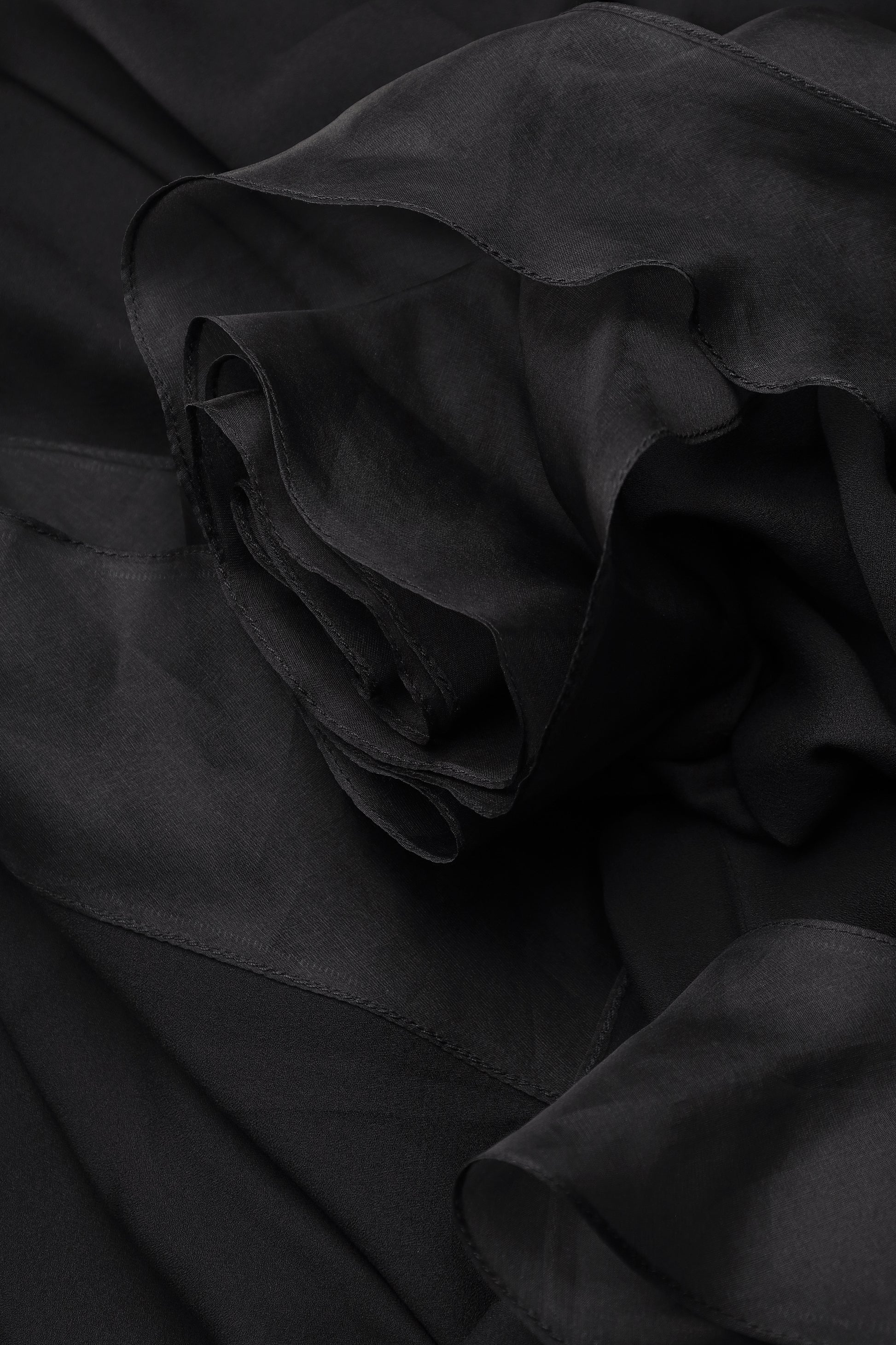 Slip dress with floral ruffle cape in black