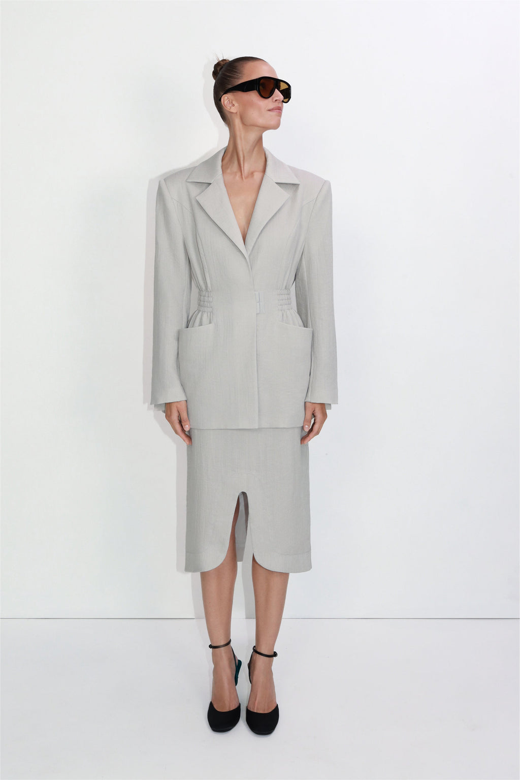 Tailored viscose-nylon midi skirt with front slit