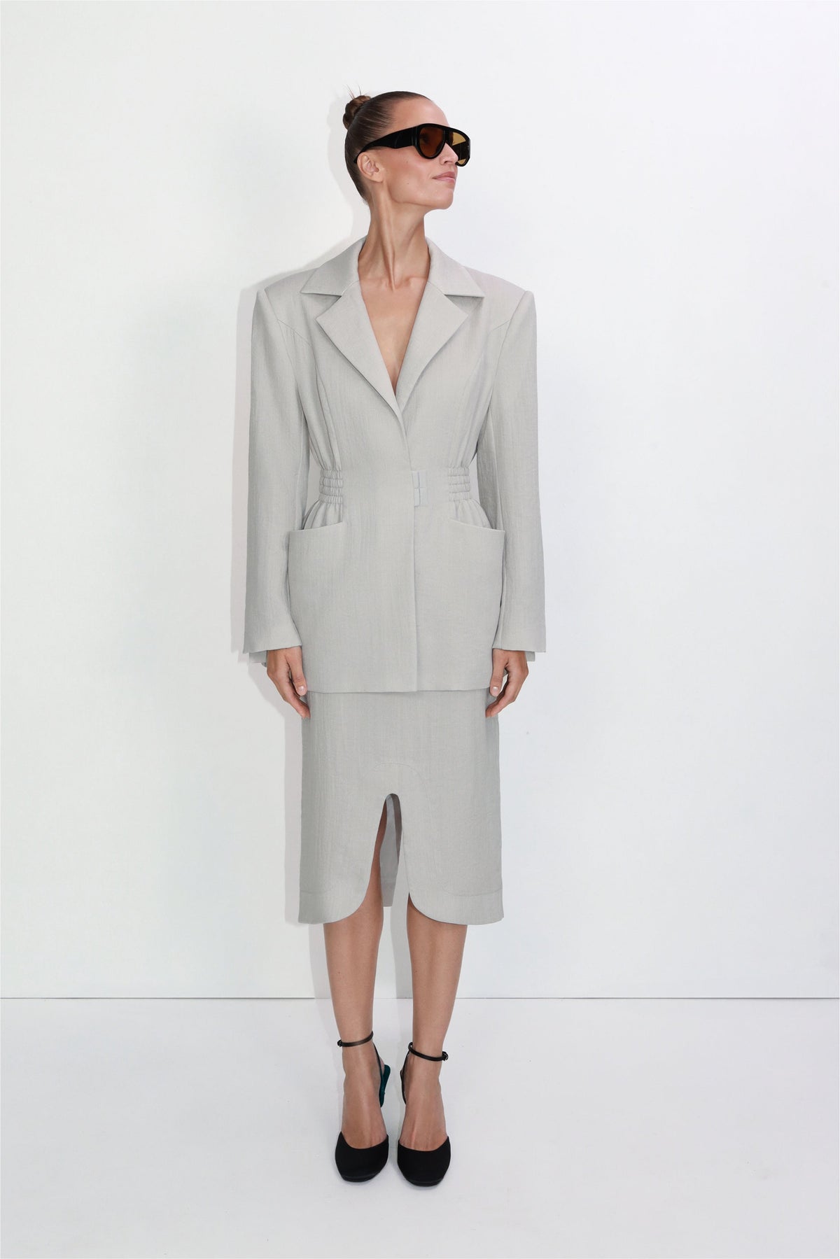 Tailored viscose-nylon midi skirt with front slit