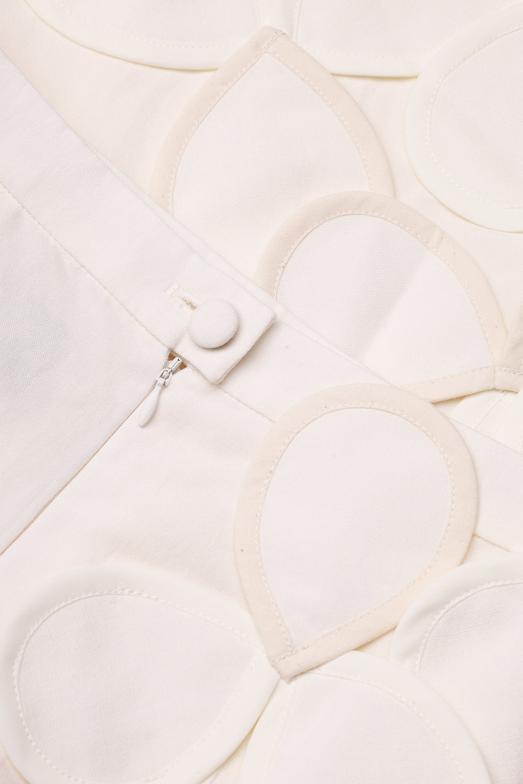 Sculptural petal-appliqué midi skirt in ivory