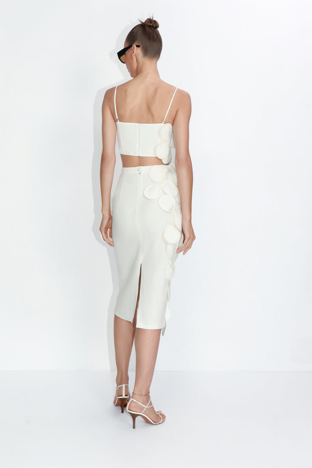 Sculptural petal-appliqué midi skirt in ivory