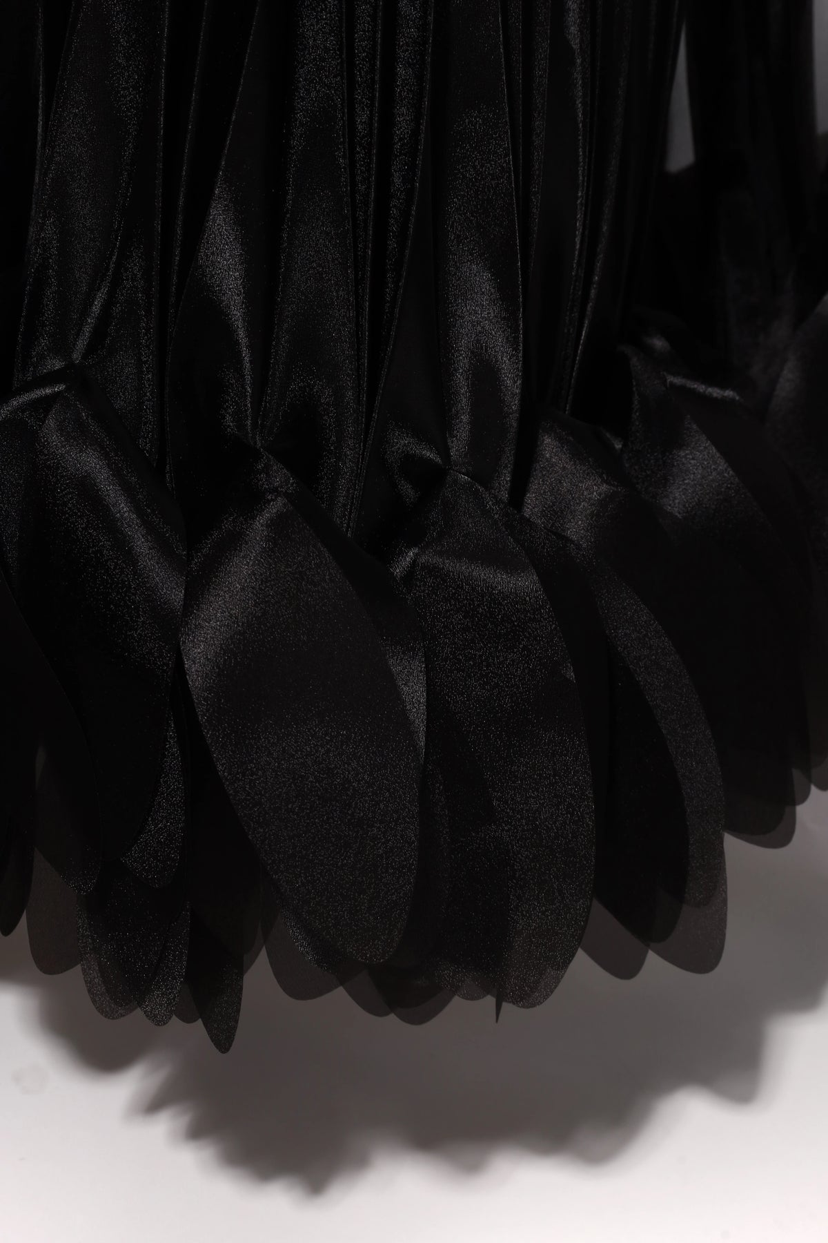 Pleated Petal Cape in Black