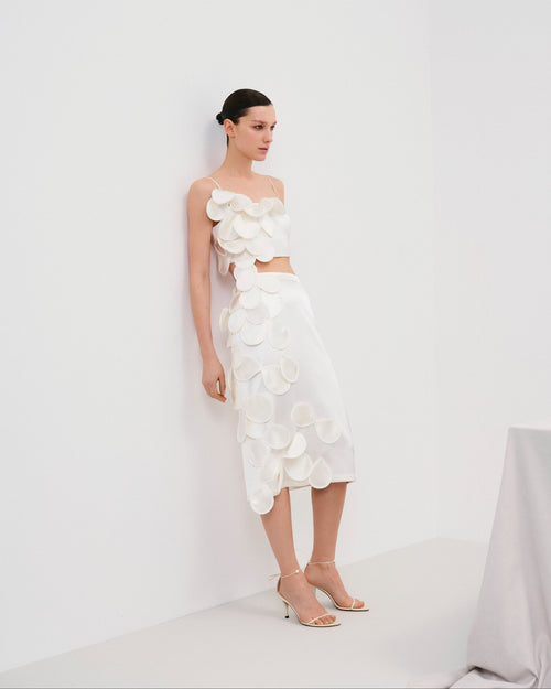 Below-knee bridal skirt featuring decorative floral appliqués (handcrafted decor).