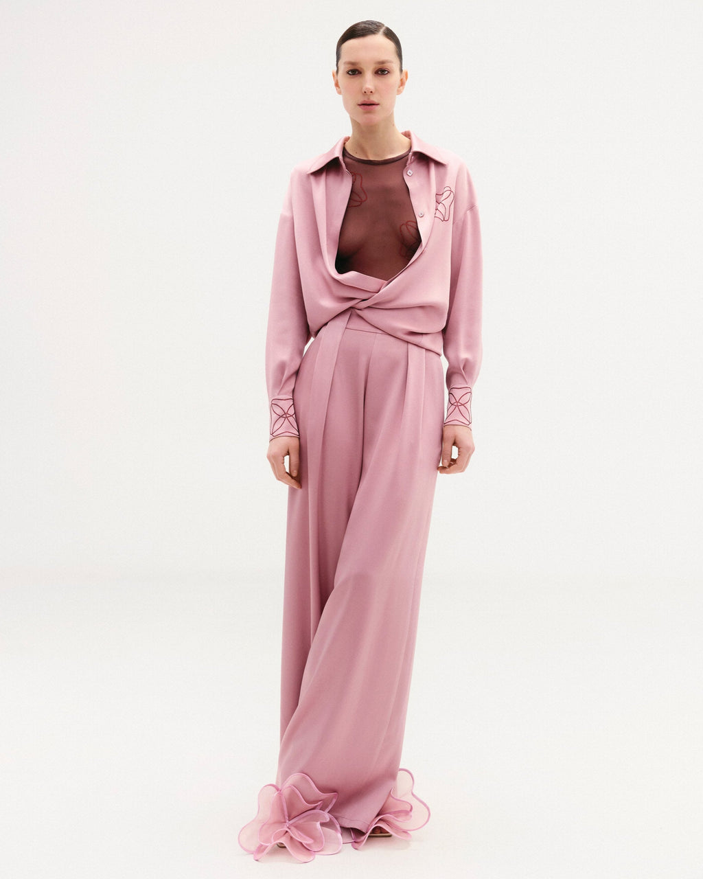 High-waisted loose-fitting pants.