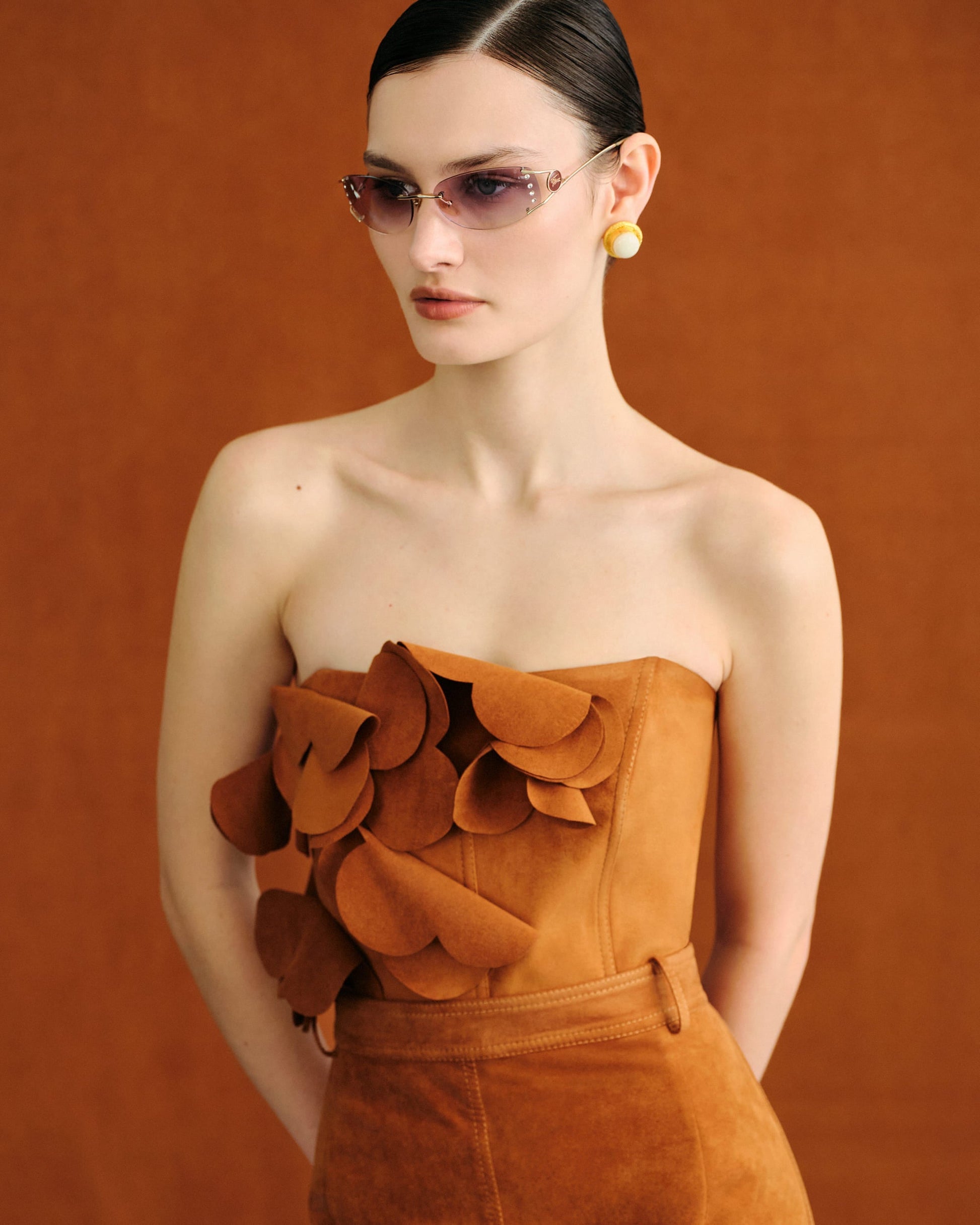 Corset top with handmade floral decorative elements