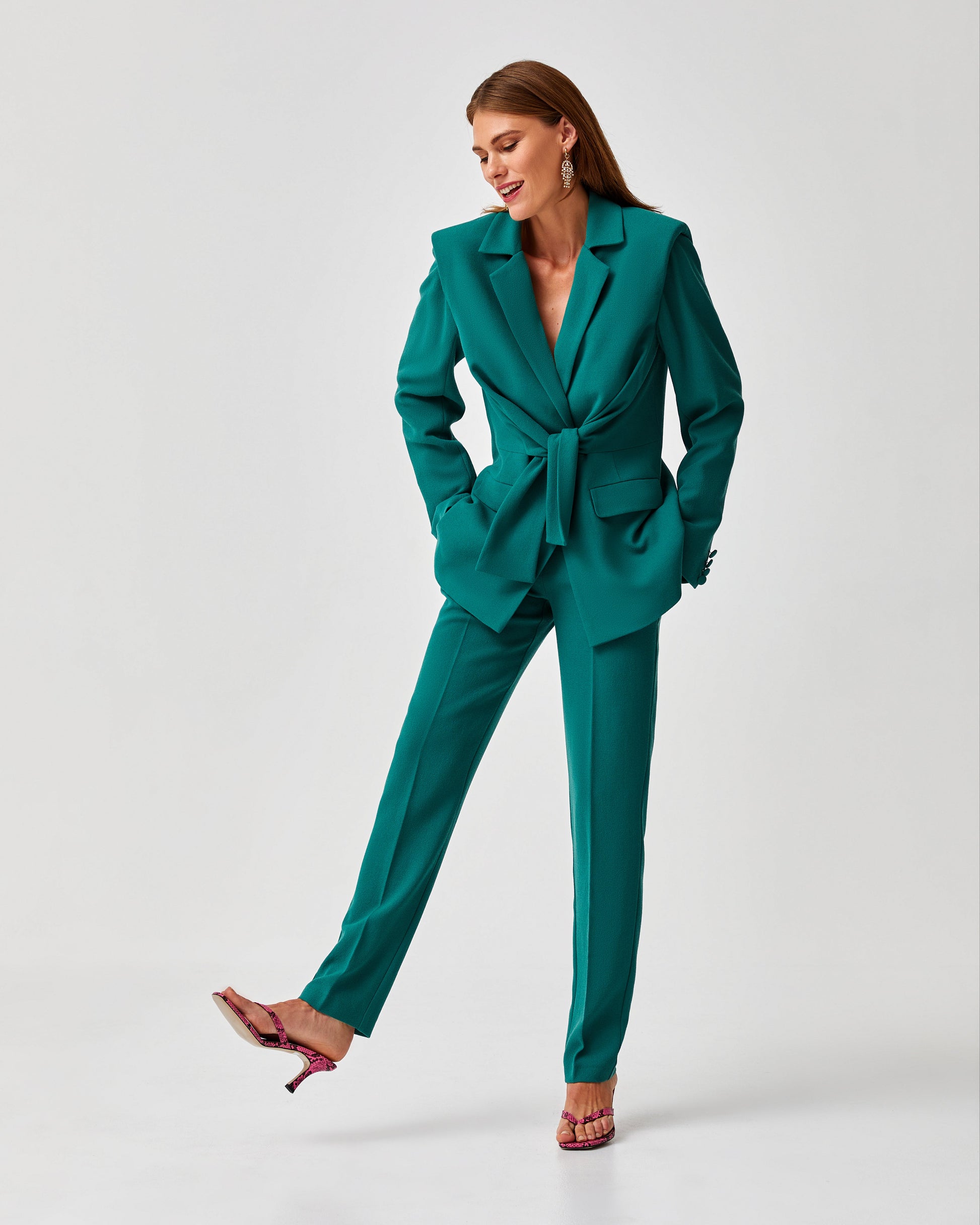 Long straight high waist trousers with side pockets, front zipper button.