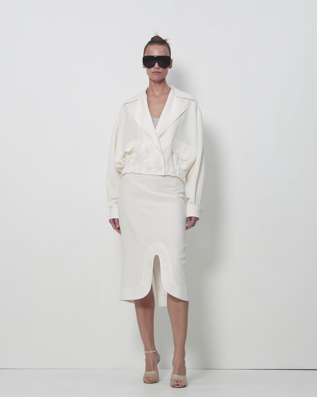 Clean-Line Front-Slit Midi Skirt in Ivory