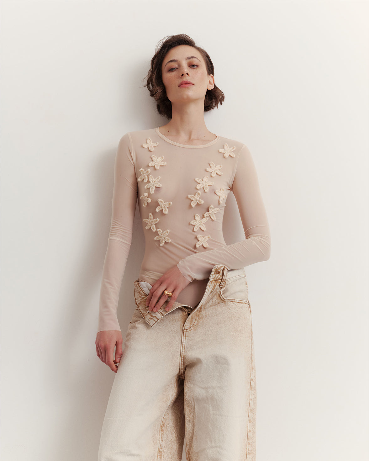Mesh bodysuit with crochet flowers