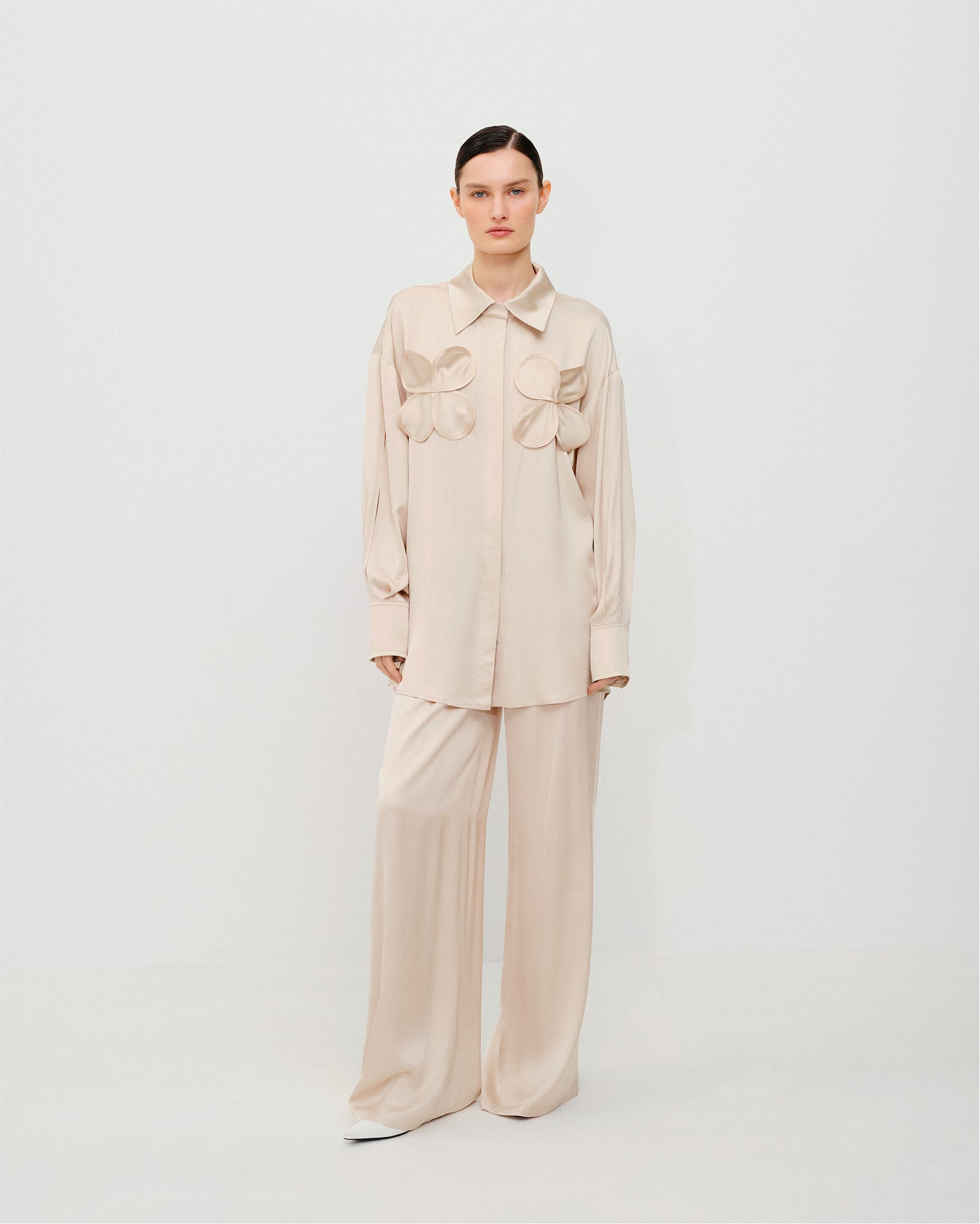Shirt with handmade decorative elements in champagne