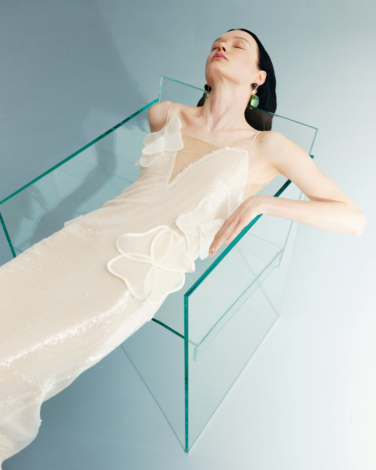 Sequin maxi dress on the straps, handmade decorative elements. Fastens on the back with a zipper.