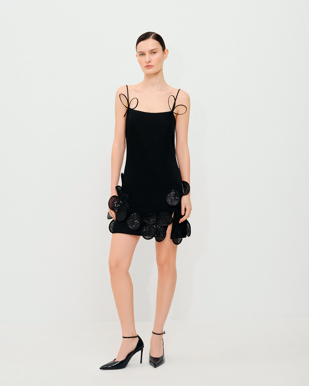 Black Mini Dress with Floral Decorative Elements and Straps