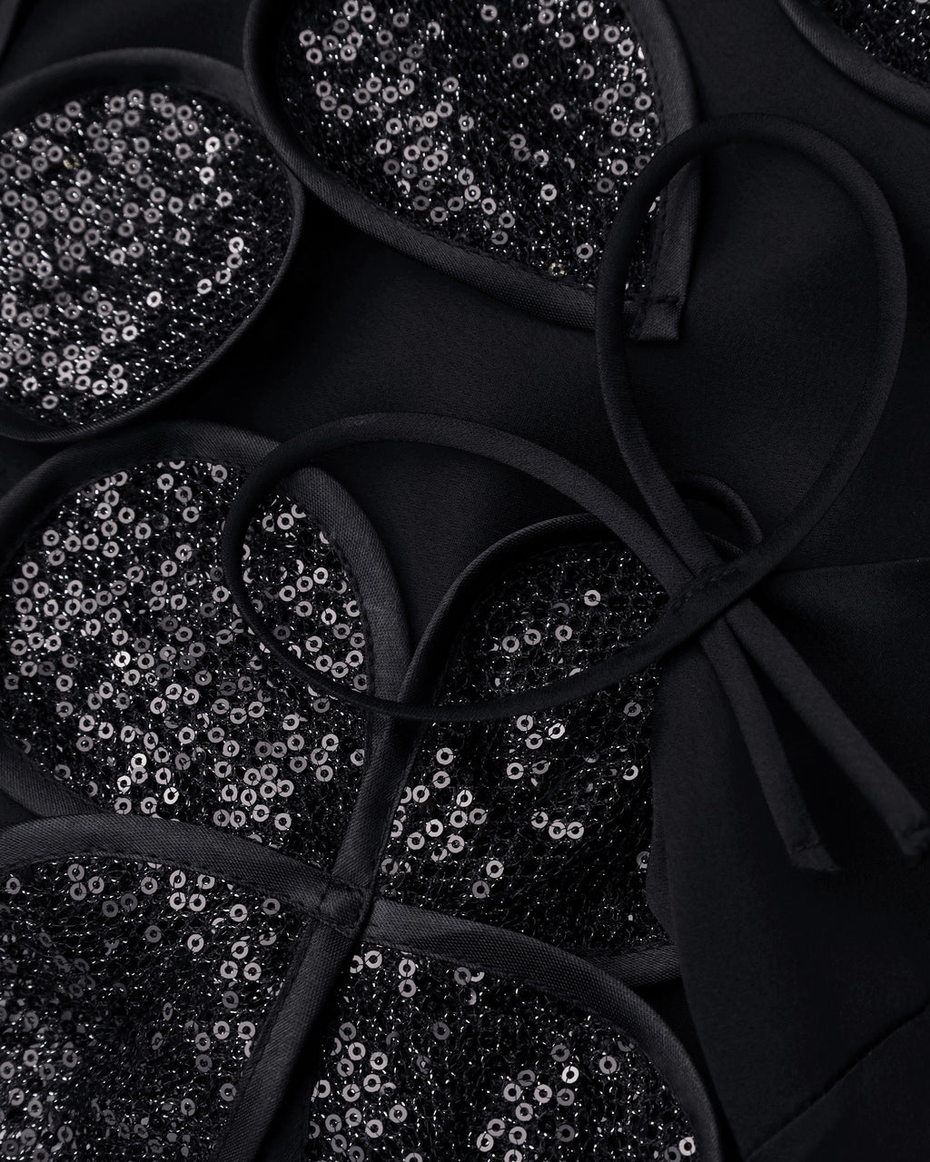 Black Mini Dress with Floral Decorative Elements and Straps