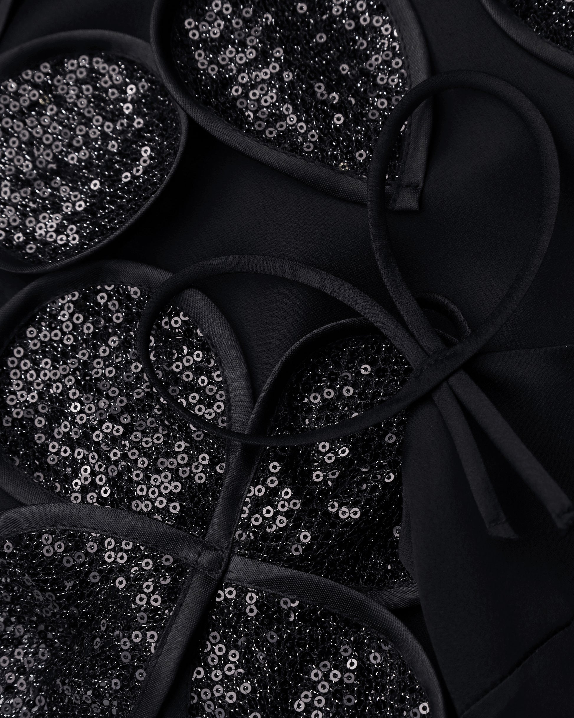 Black Mini Dress with Floral Decorative Elements and Straps